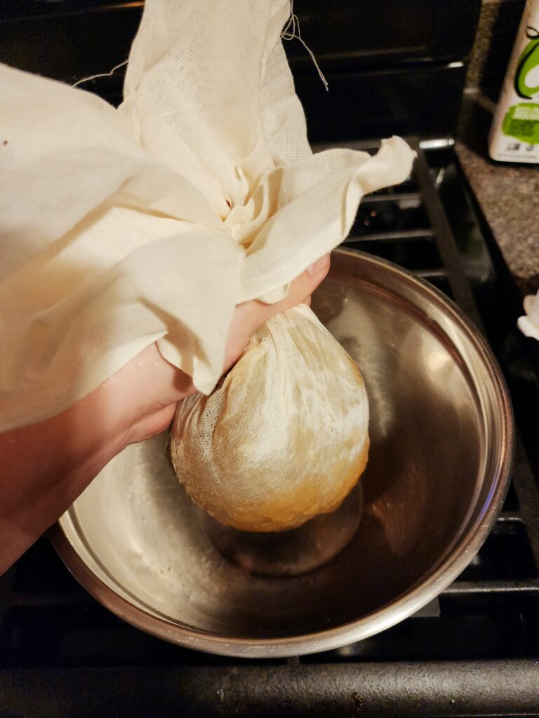 Squeezing out flaxseed gel through cheesecloth