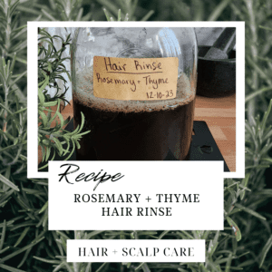 Rosemary and thyme decoction in a glass jar